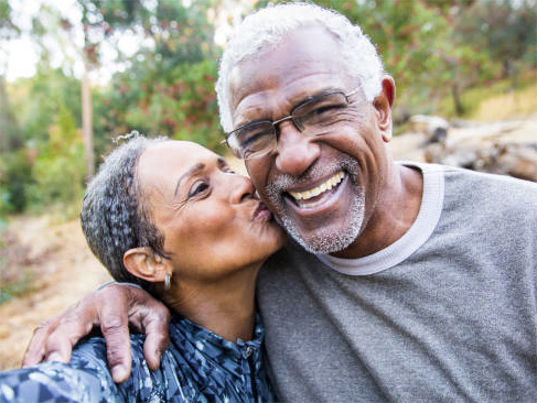 older couple kissing