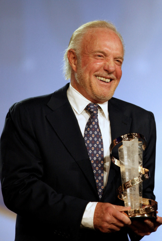 James Caan holding award